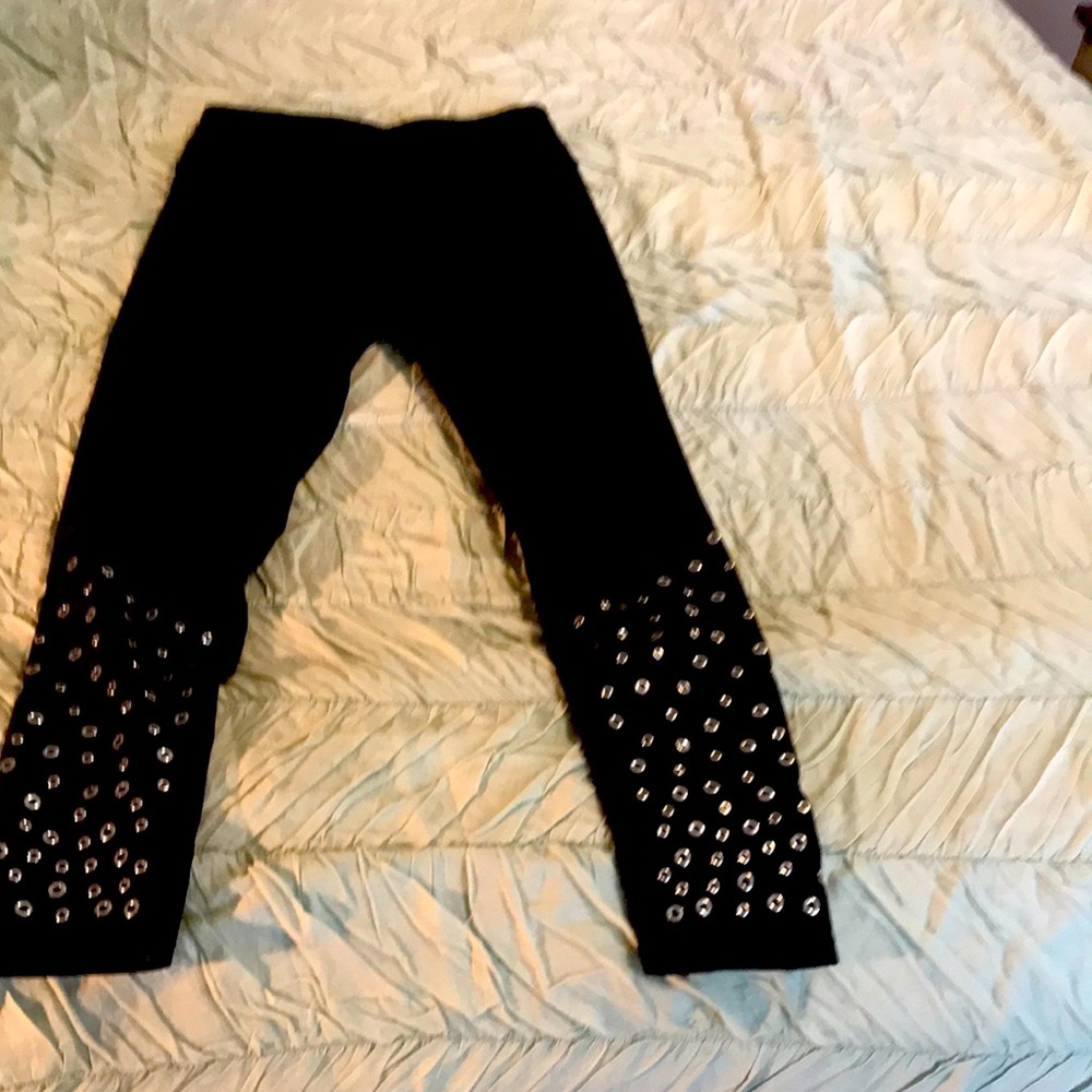 Soul Cycle Black leggings with studs.